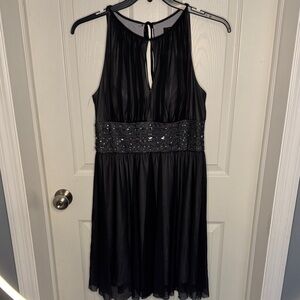 La Nouvelle Renaissance Elegant Black Midi Dress with Sequin Detail